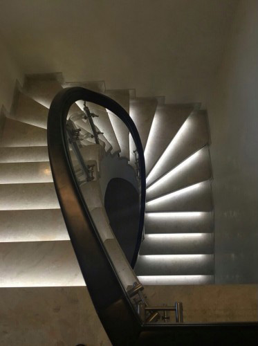 Curved glass stair railing